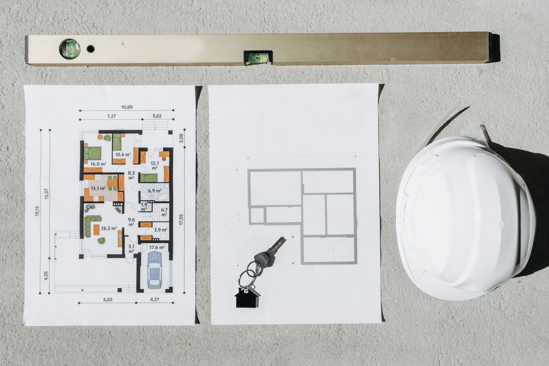Blueprints hard hat and plans for an Arizona home renovation permit and remodel project