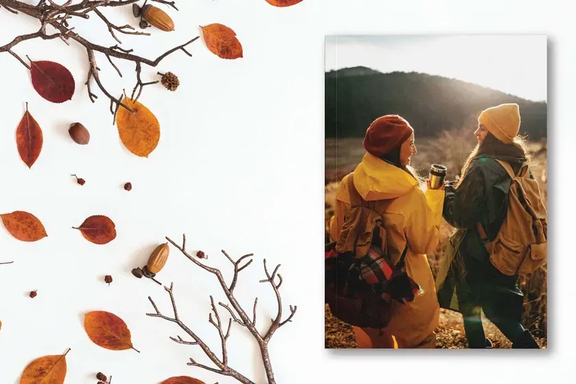 A printed book with a picture of a man and a woman on the beach