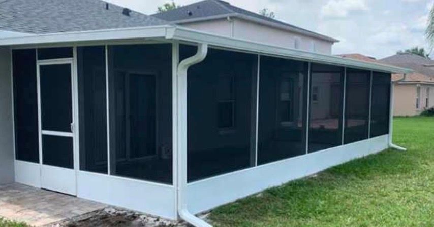 Deck and patio construction in progress in a Florida backyard