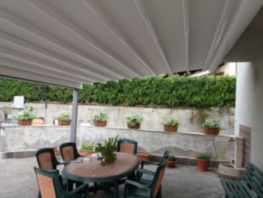 tenda a pacchetto per veranda