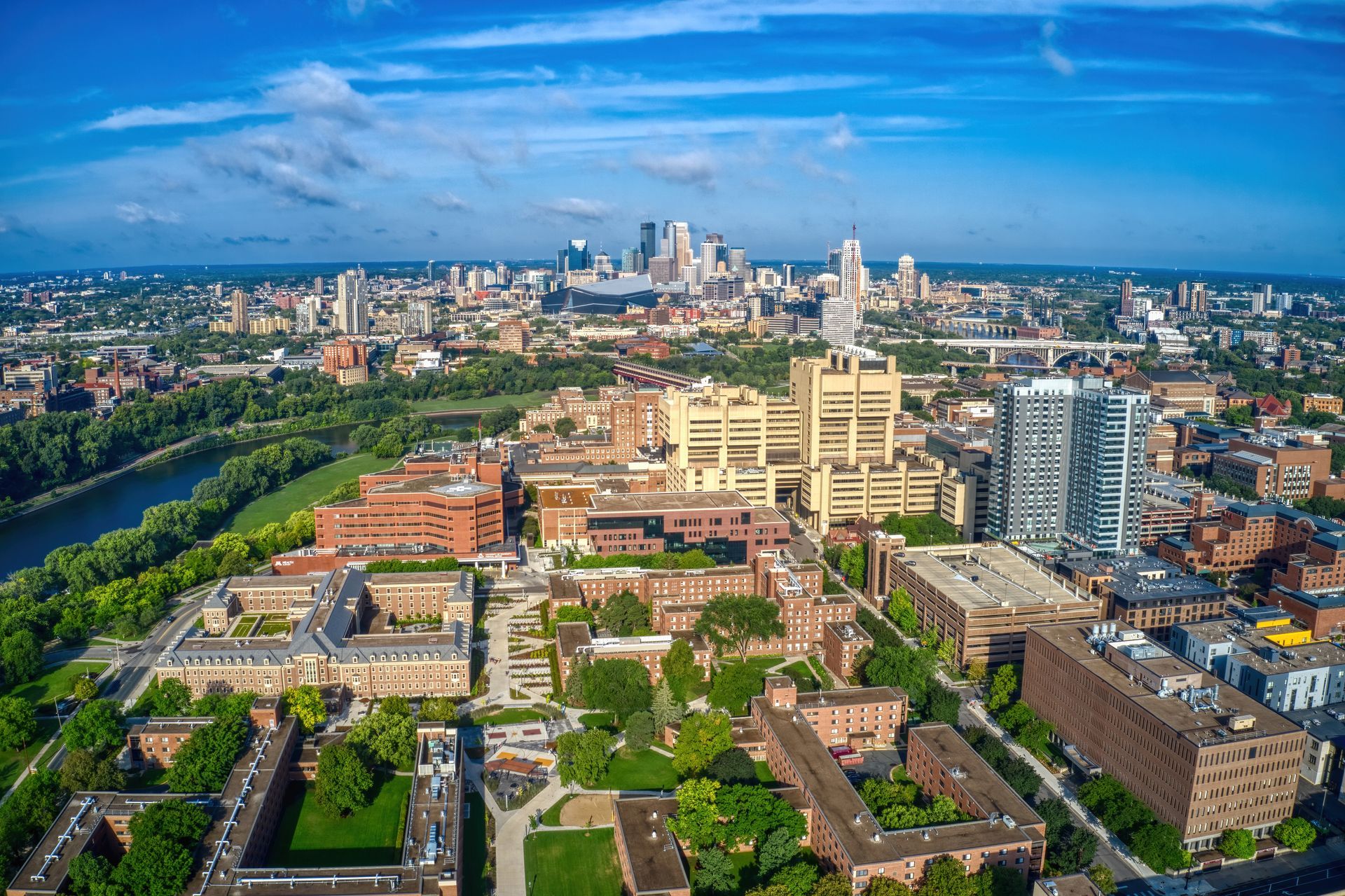 An aerial view of a city with a river running through it.