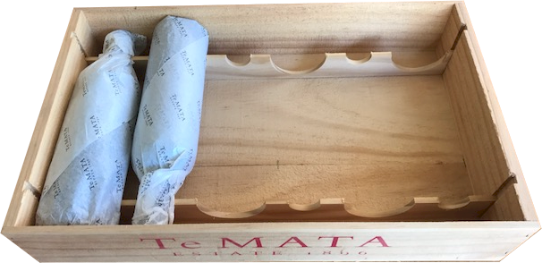 A wooden box with the word mata on it