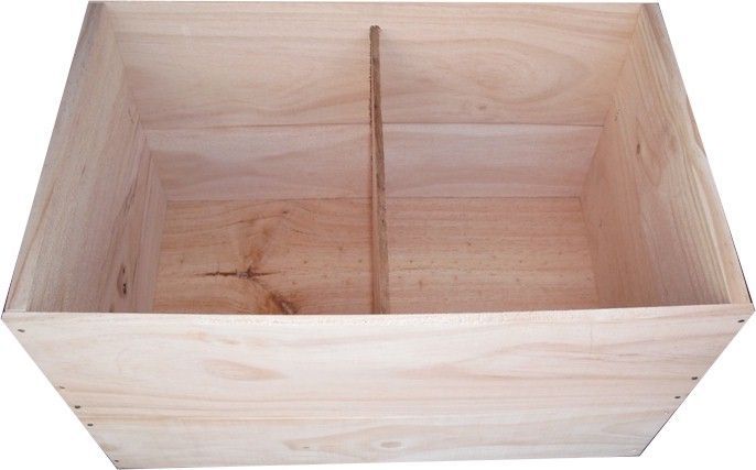 A wooden box with a metal stick in it