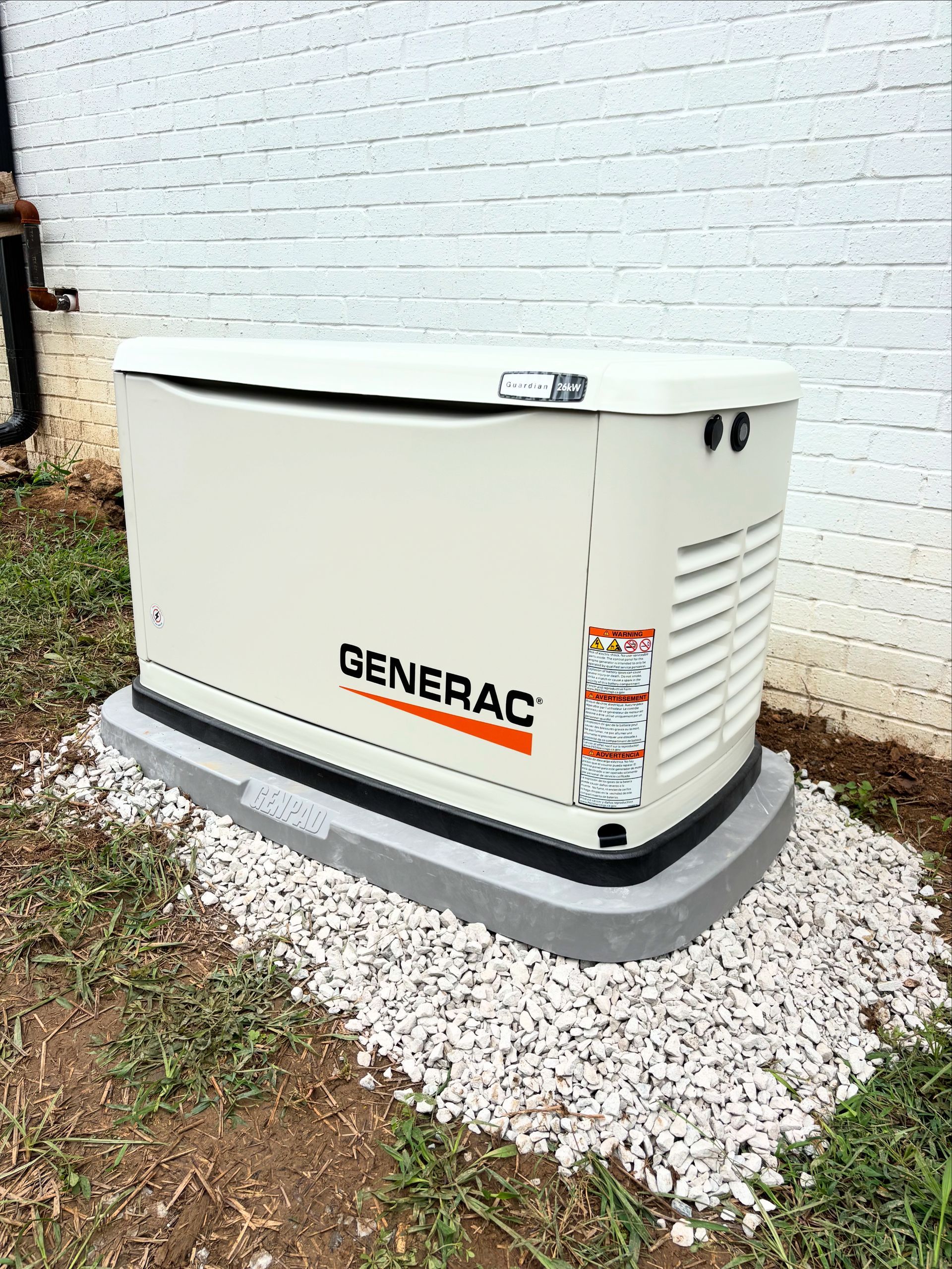 Furnace in a basement, with ductwork and storage bins. Silver metal, gray, white, and green tones.
