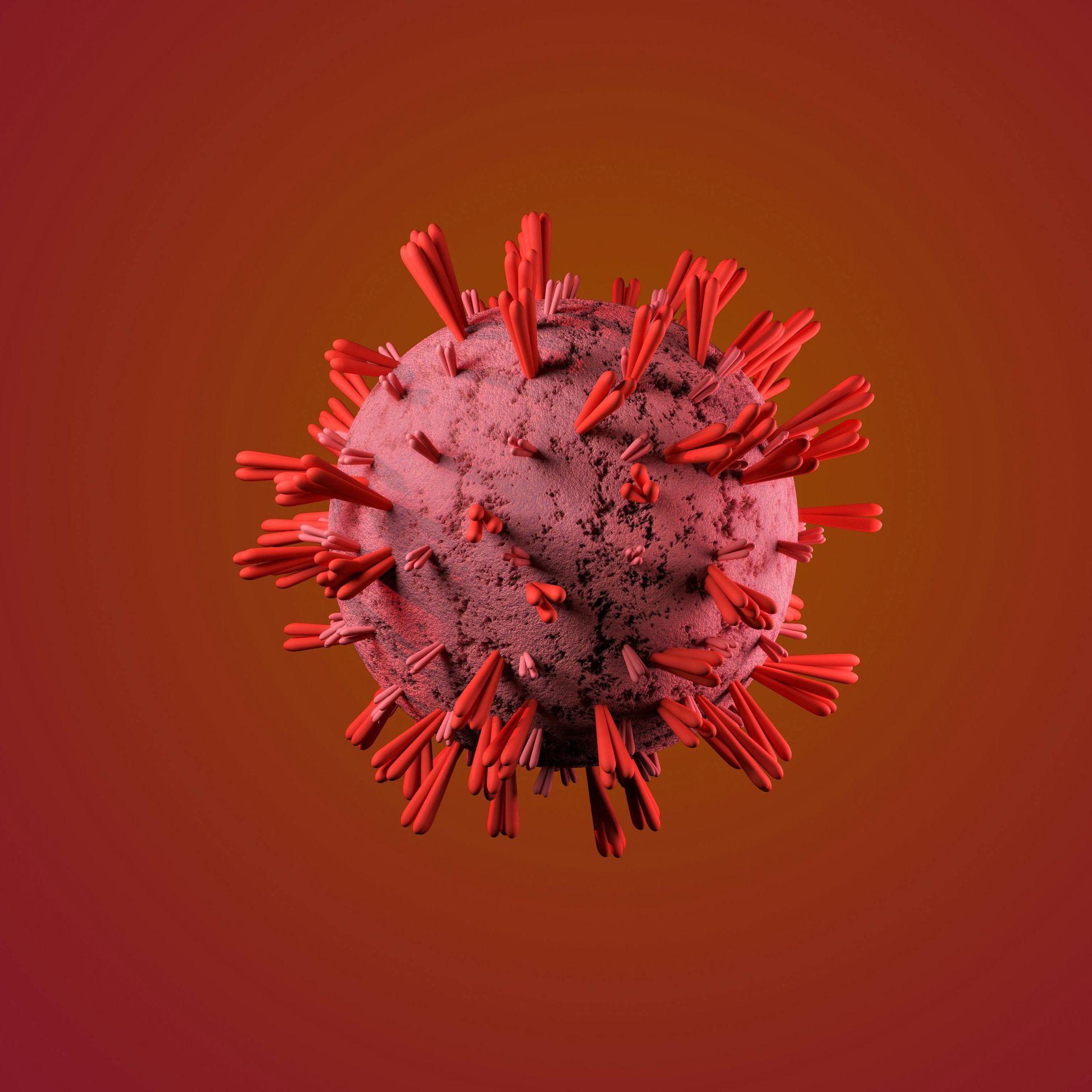 Red spiky virus particle on a dark red background