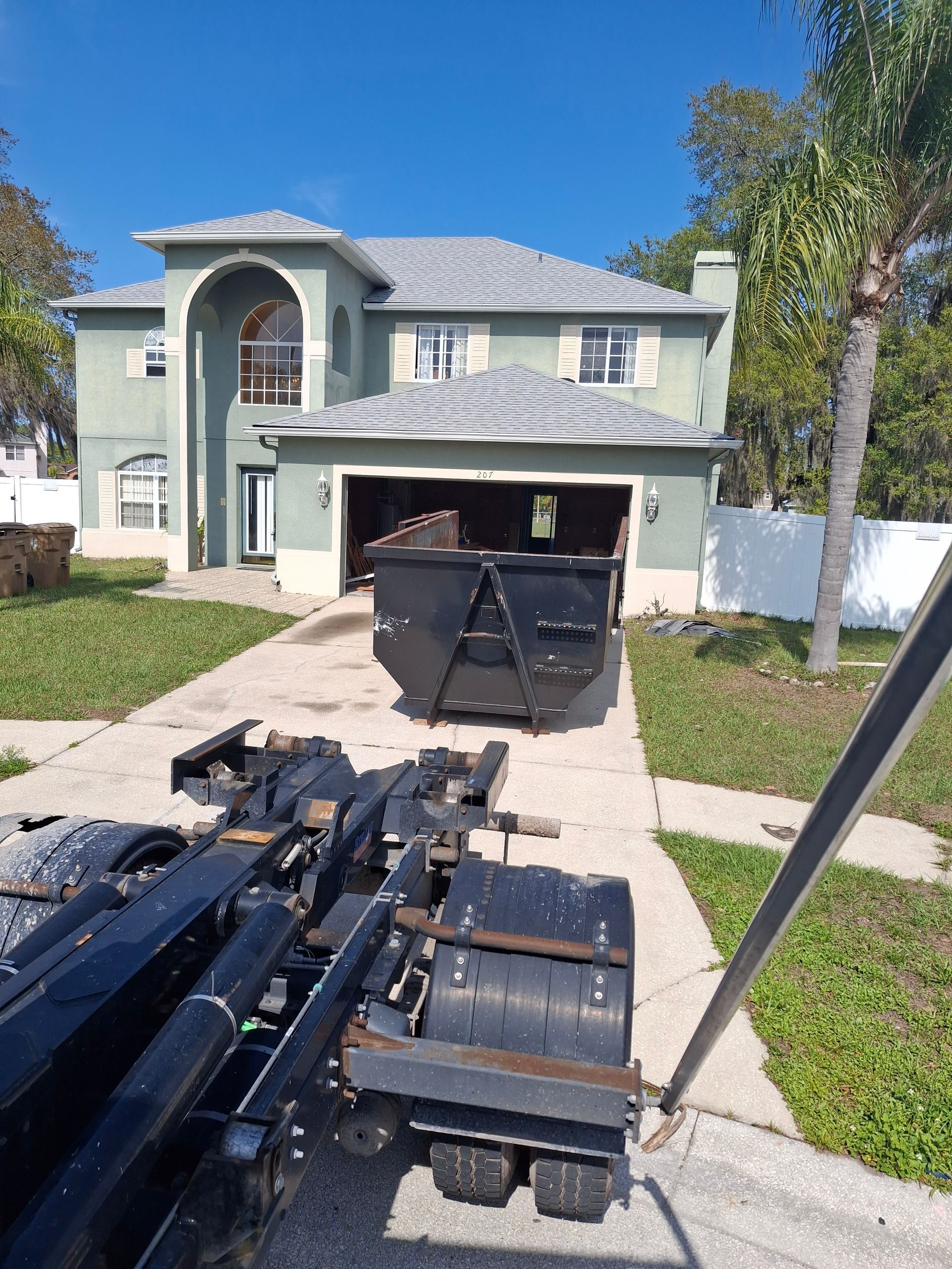 20‑yard dumpster used for a home renovation project in Poinciana, Florida.