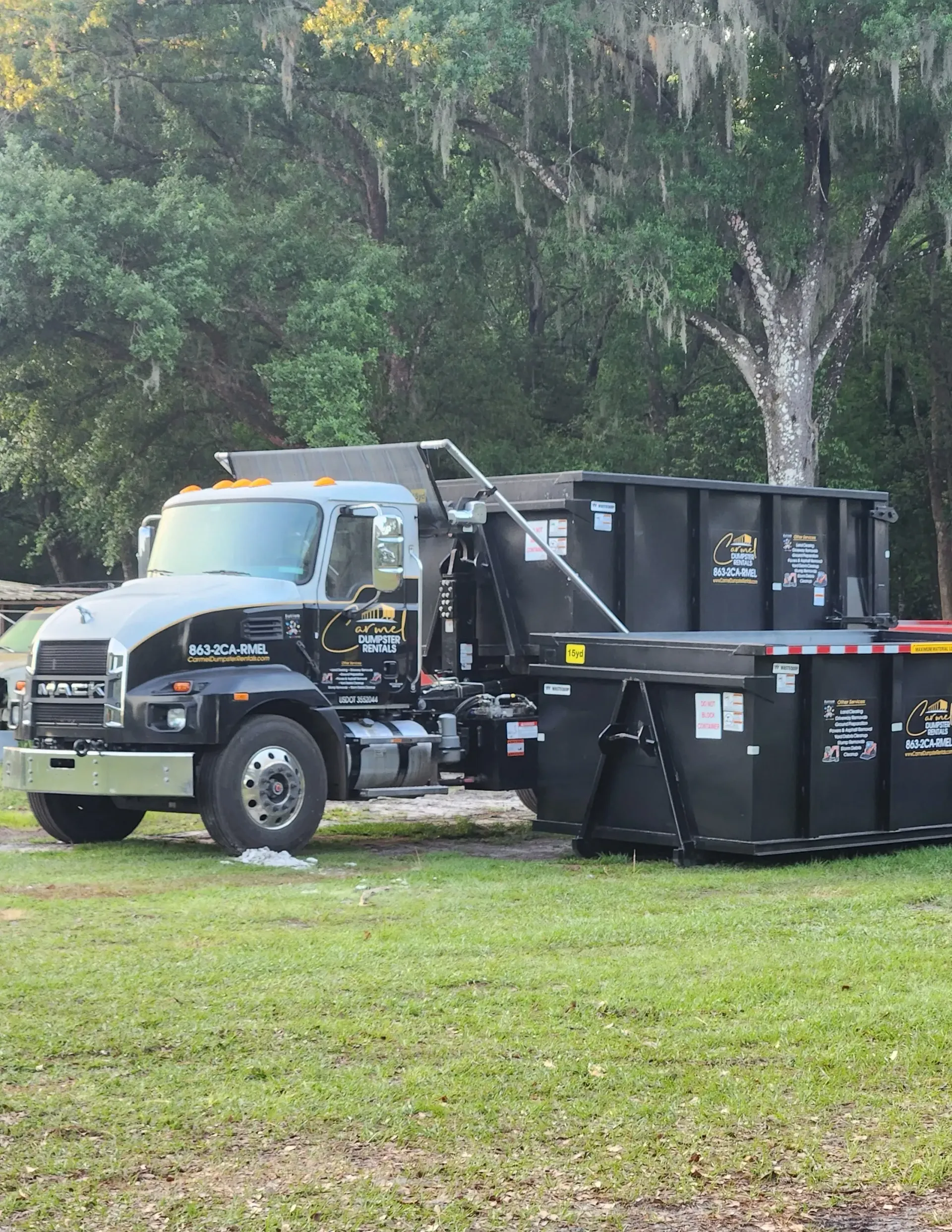 Hooklift dumpster truck used for residential dumpster rentals in Polk County FL