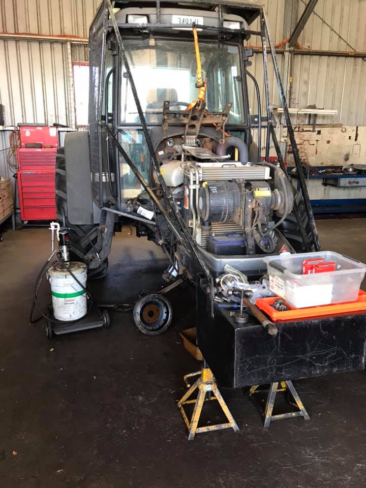 Tractor Getting Repaired In Workshop — Tractor Repairs in North Lismore, NSW