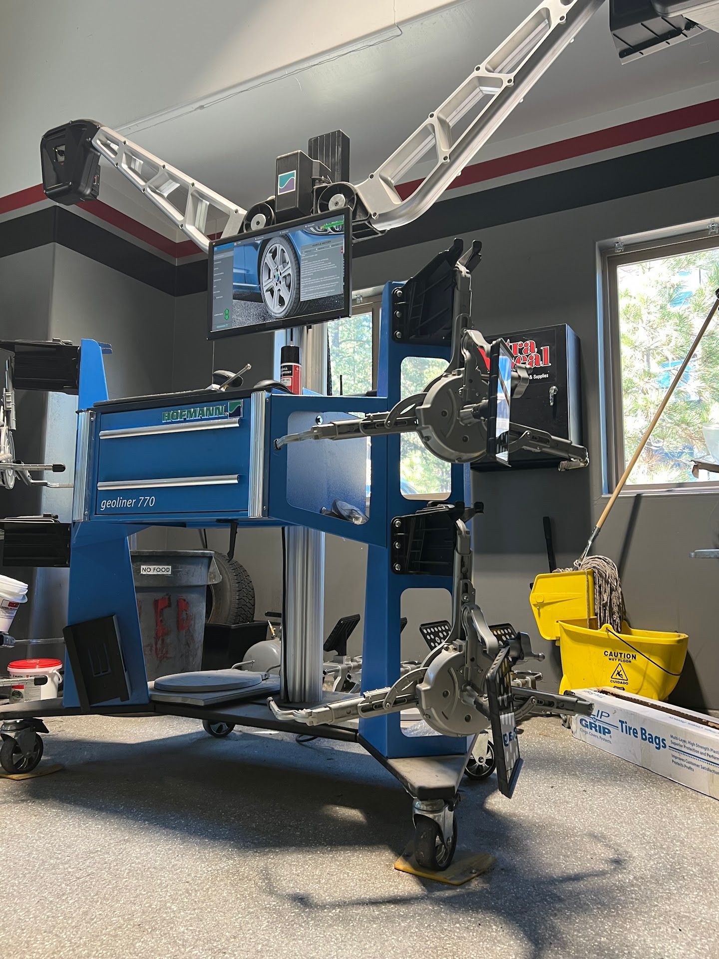 Wheel Alignment Equipment Inside The Auto Repair Shop | German Import Garage