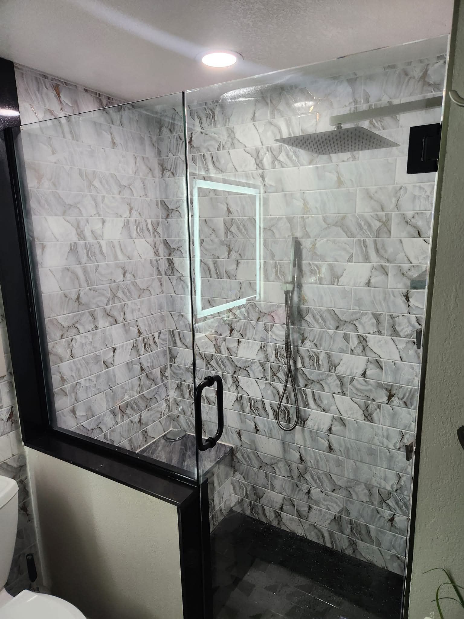 Frameless Glass Shower Enclosure With Half Wall