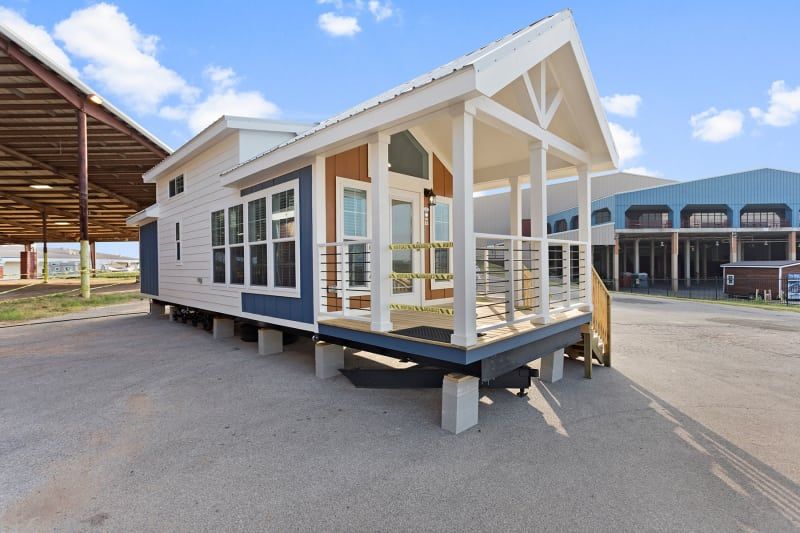 APH 528 White and Blue Exterior — Mansfield, TX — Factory Showcase Homes LLC