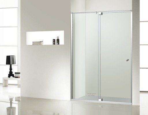 A sleek glass shower door enclosure with a silver frame in a modern, minimalist white bathroom.