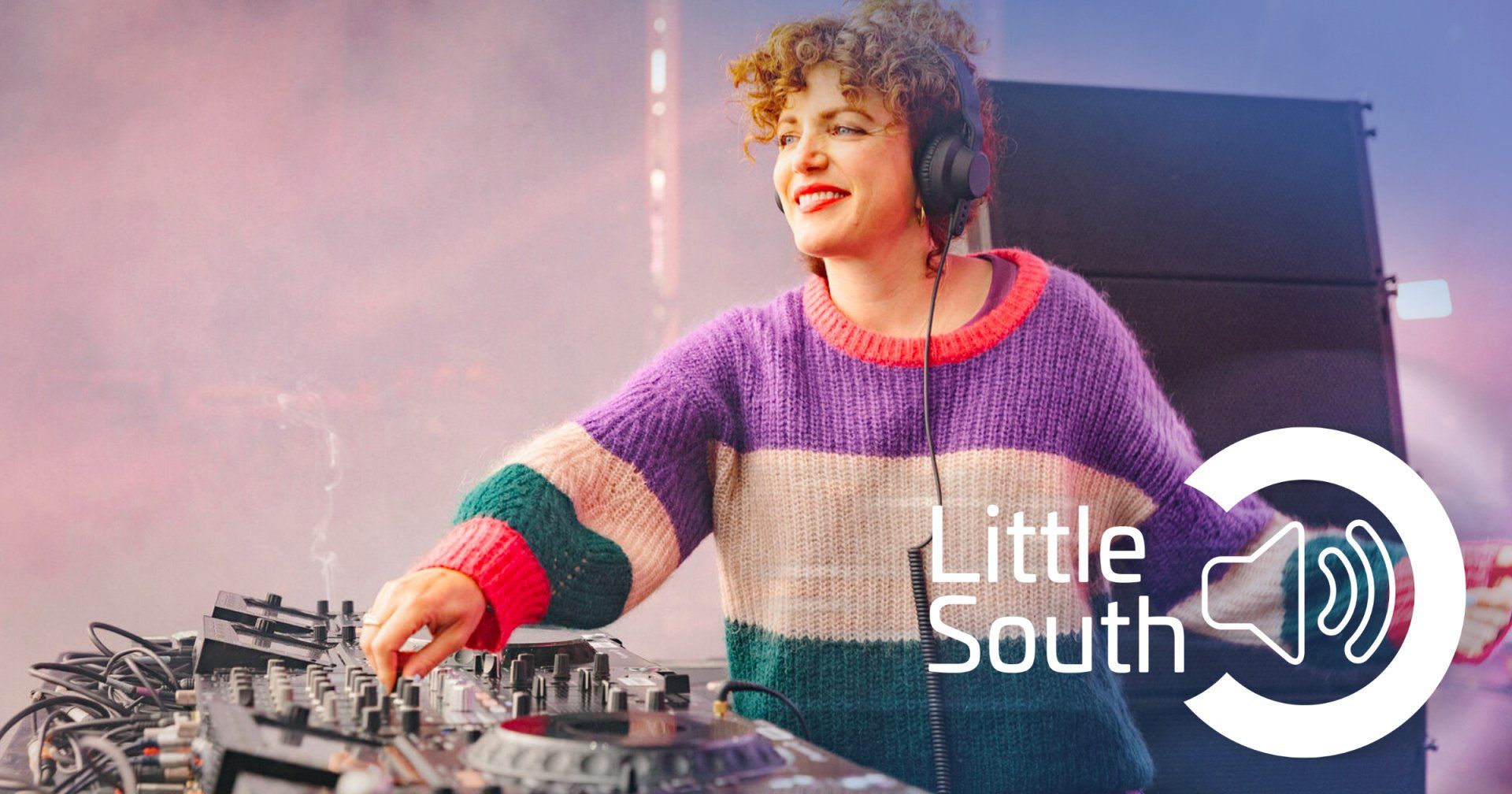 A woman wearing headphones is playing music on a dj controller.