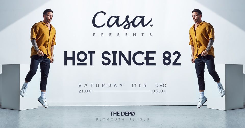 Two men are standing in front of a sign that says casa hot since 82
