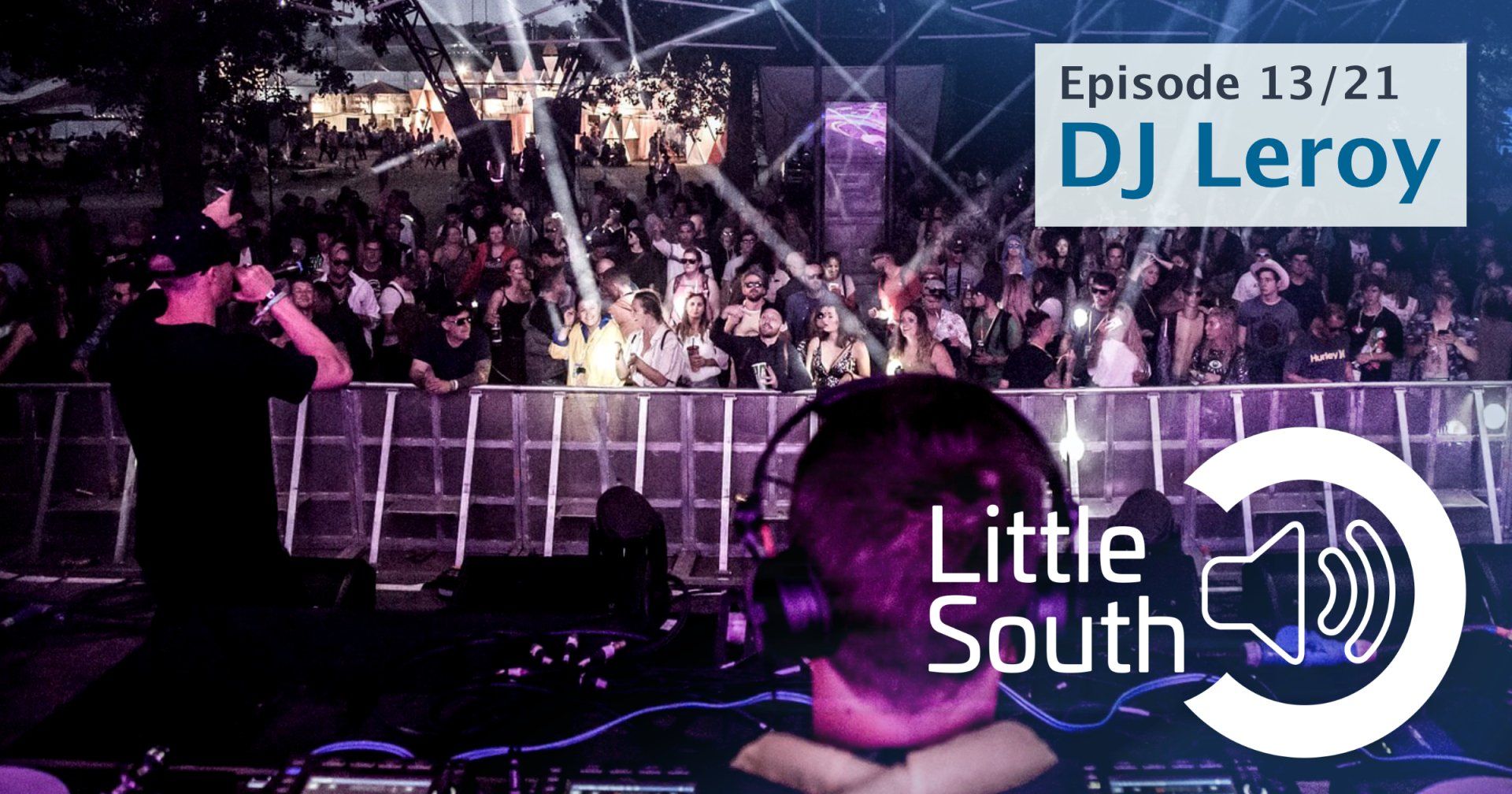 A dj is playing music in front of a crowd at a little south event.