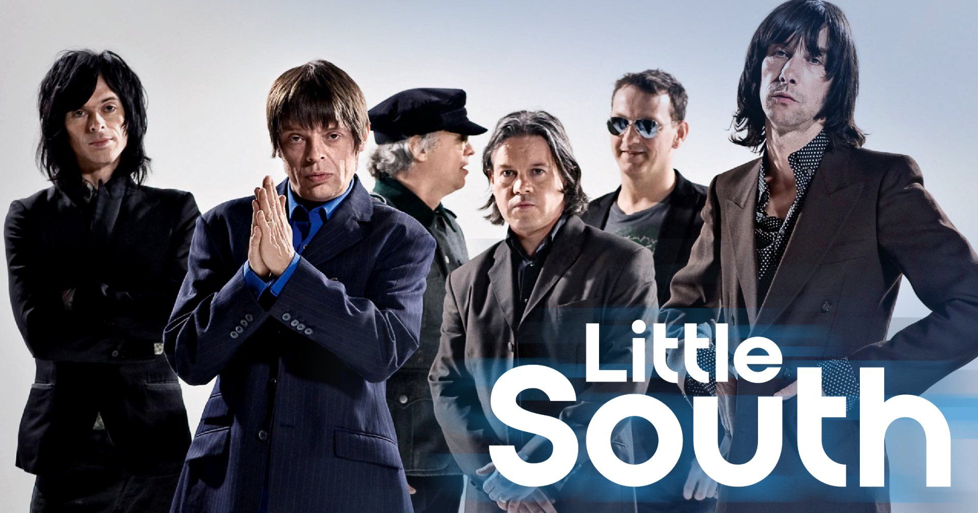 A group of men standing next to each other with the words little south above them