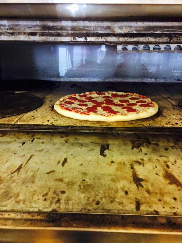 Pizza in the oven — Mifflinburg, Pa — The Original Italian Pizza & Restaurant