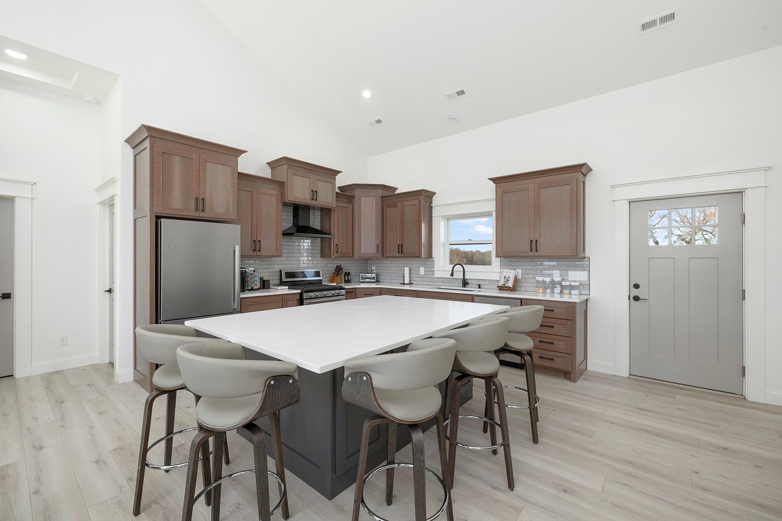 There is a large island in the middle of the kitchen.
