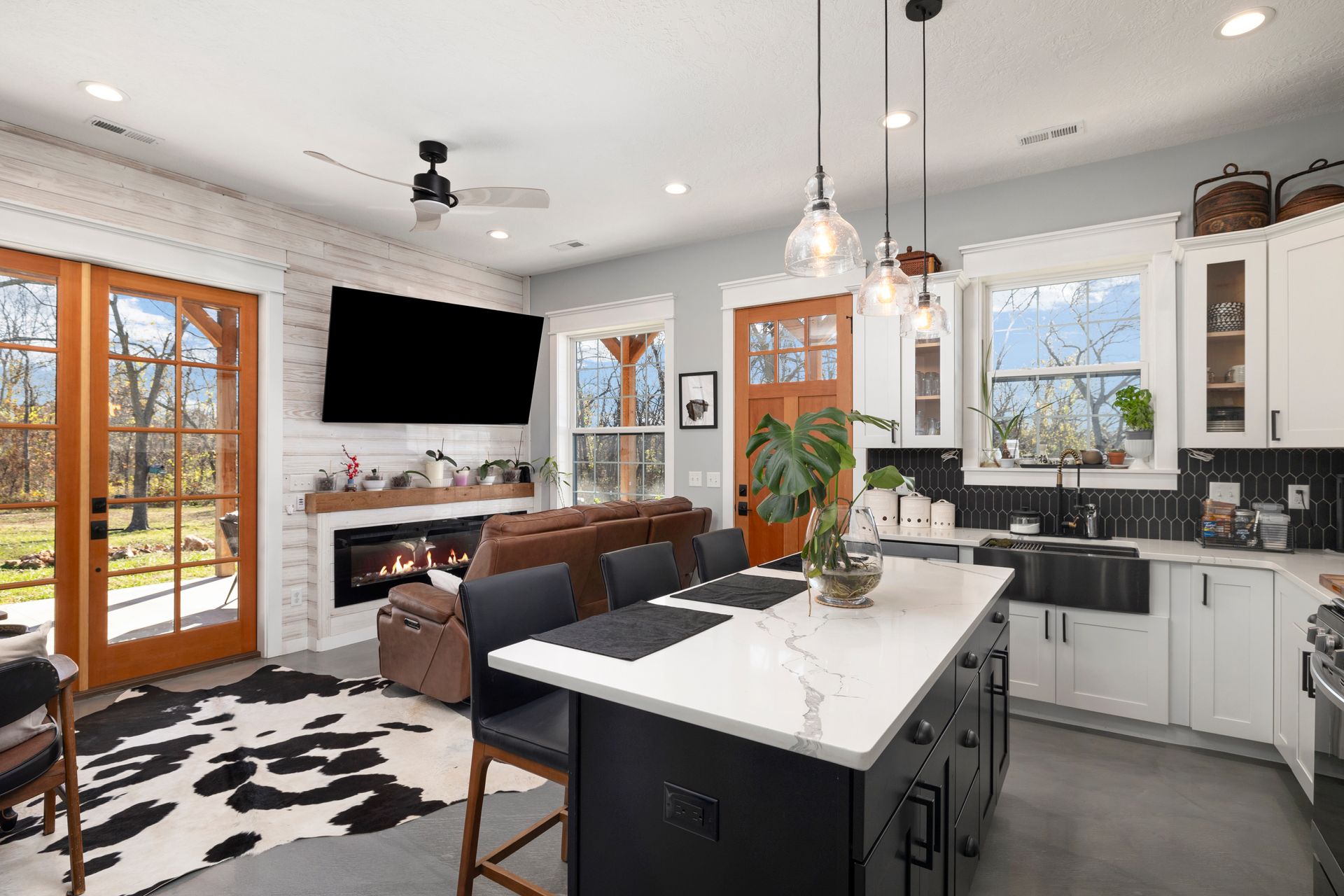 A kitchen with a large island in the middle of the room.
