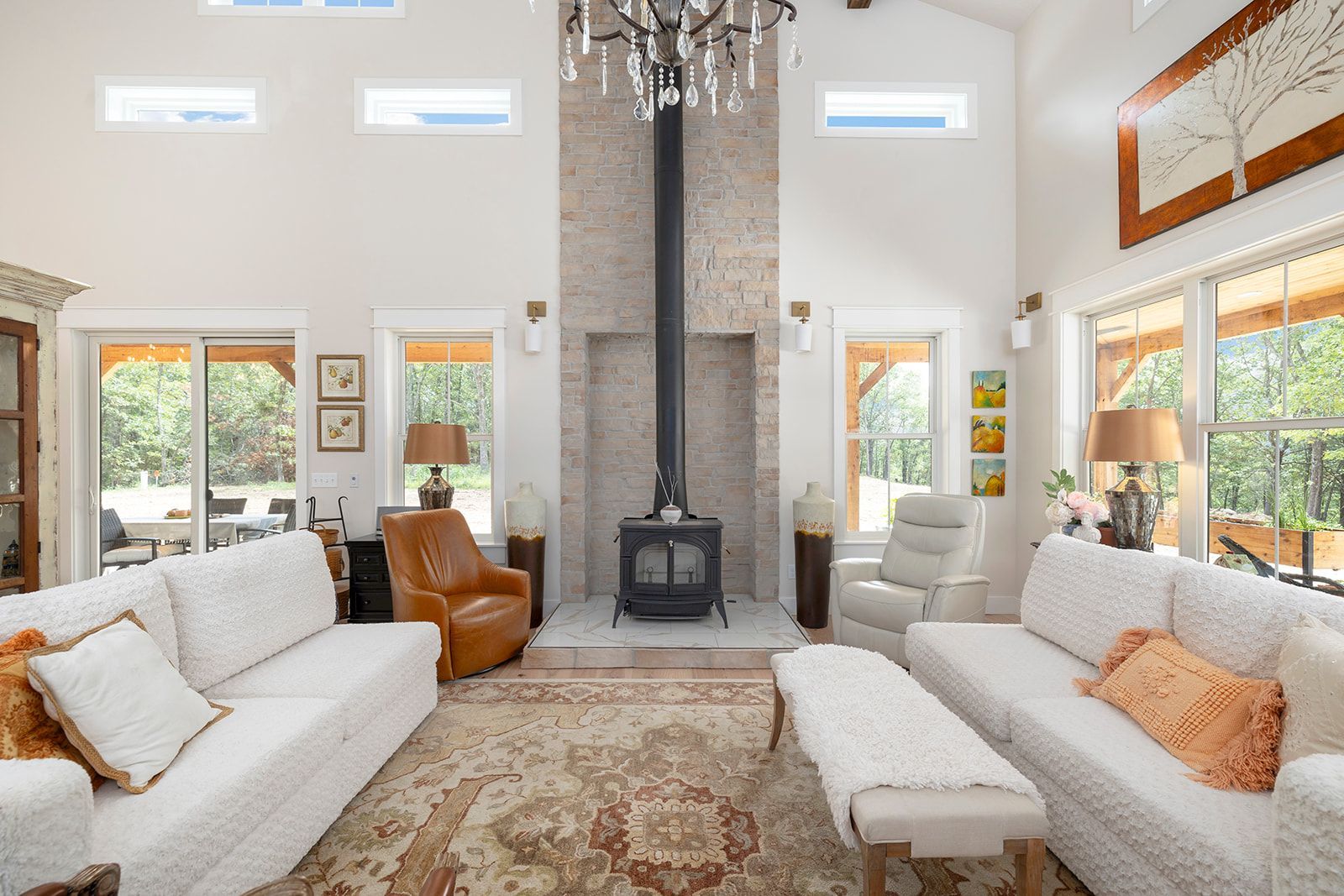 A living room filled with furniture and a fireplace.