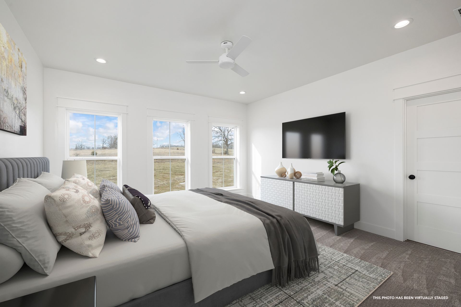 An artist 's impression of a bedroom with a large bed and a flat screen tv.