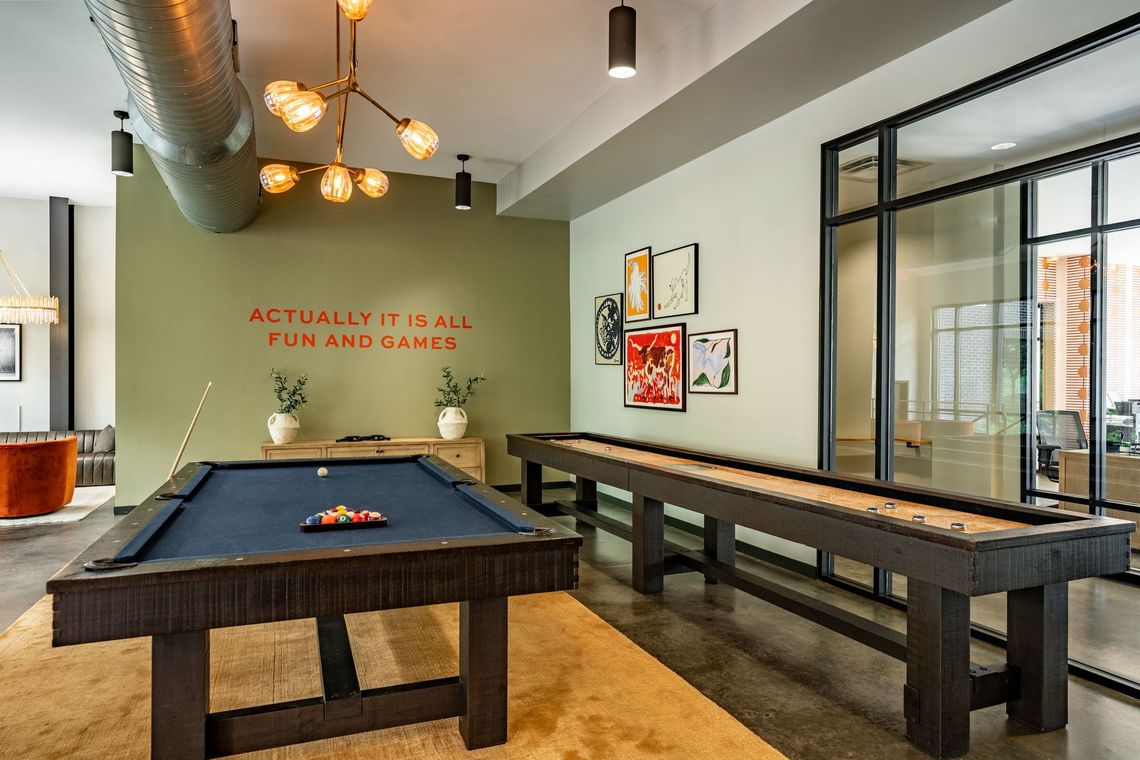 Eastside Heights gameroom with billiards and shuffleboard