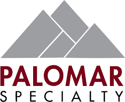 Logo of Palomar Specialty with stylized gray mountain peaks above text.