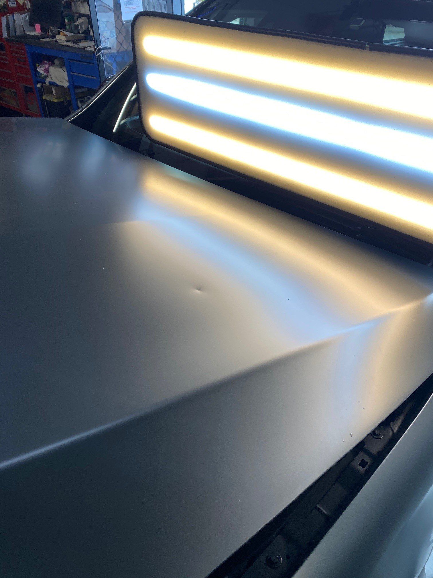 Car Hood with Dent — Taren Point, NSW — CJ's Dent Removal