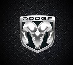 Dodge logo with silver ram head emblem on a black textured background