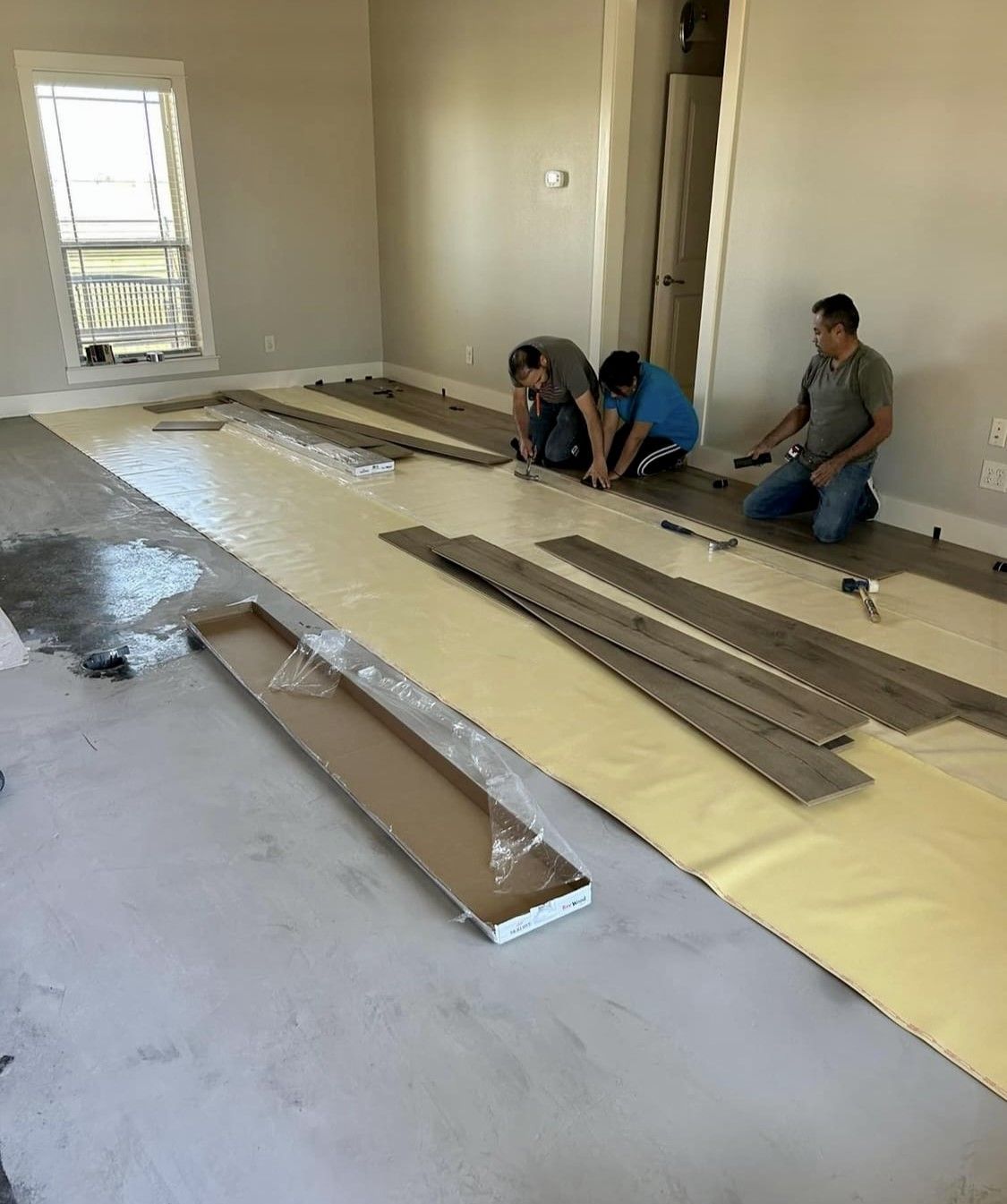 Installing Flooring - Gainesville, TX - Morris Painting & Renovation