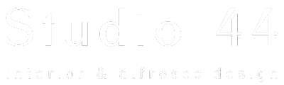 A white logo with the words studio 44 on a white background.