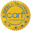CARF gold-accredited seal with blue stars and “AspirE to Excellence” text