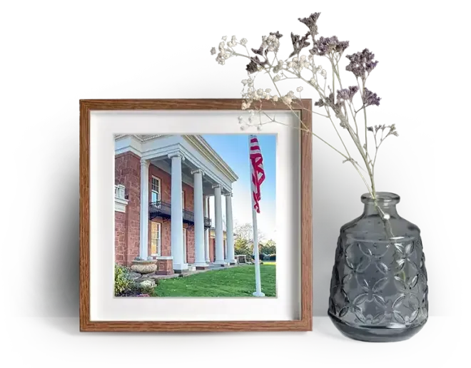 Vincent Funeral Home facade with American flag flying out front