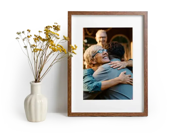 Framed photo of family members hugging