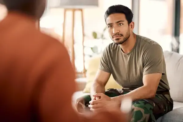 Young veteran consulting with an expert
