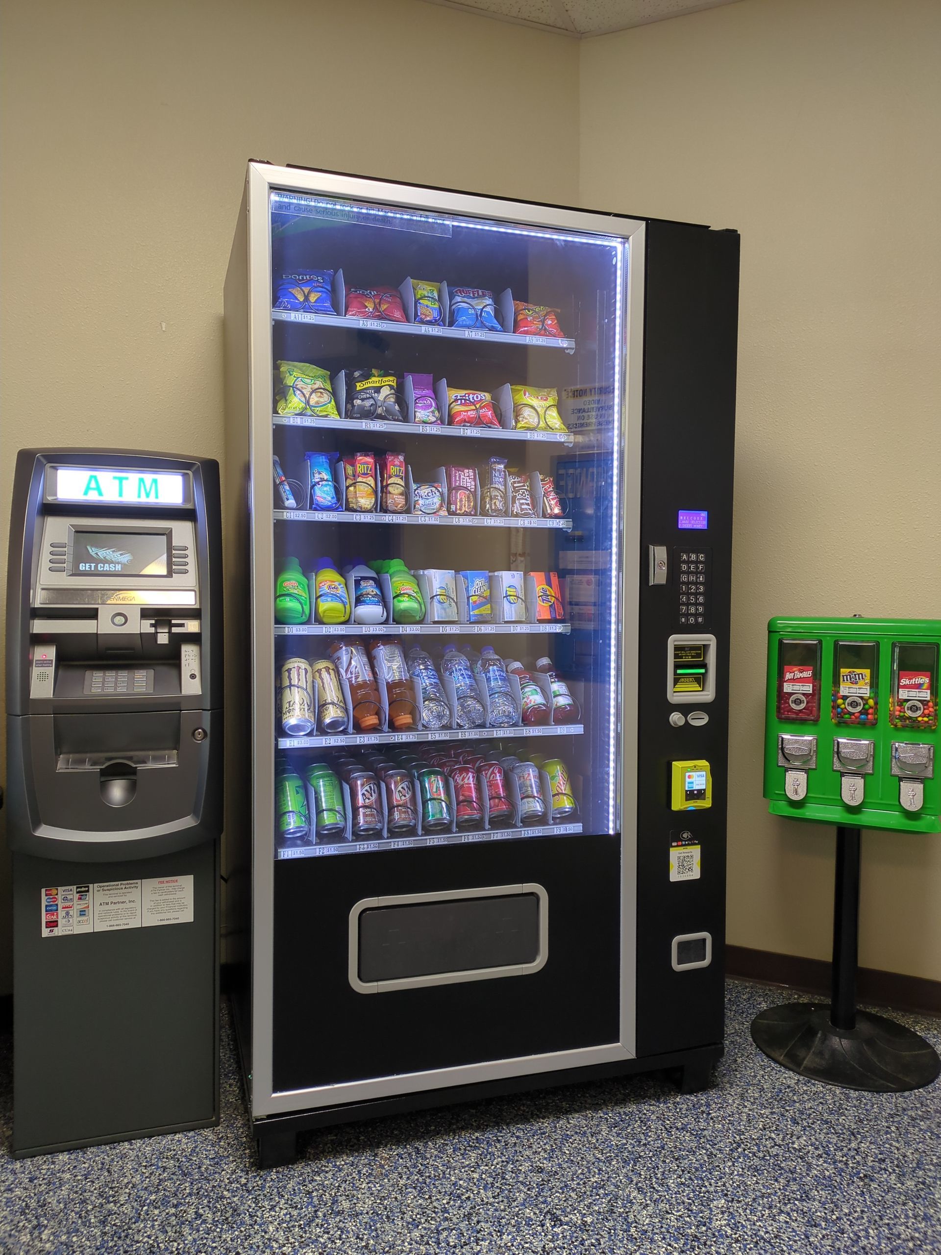 ATM and Vending Machine showing snacks, drinks, and soap