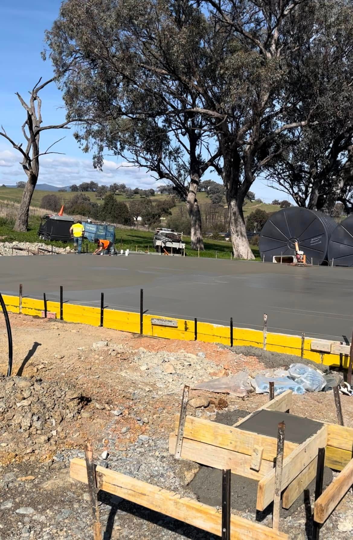 A Brick Walkway with A Lamp Post in Front of A Building — Next Level Construction Contractors in Gundagai, NSW