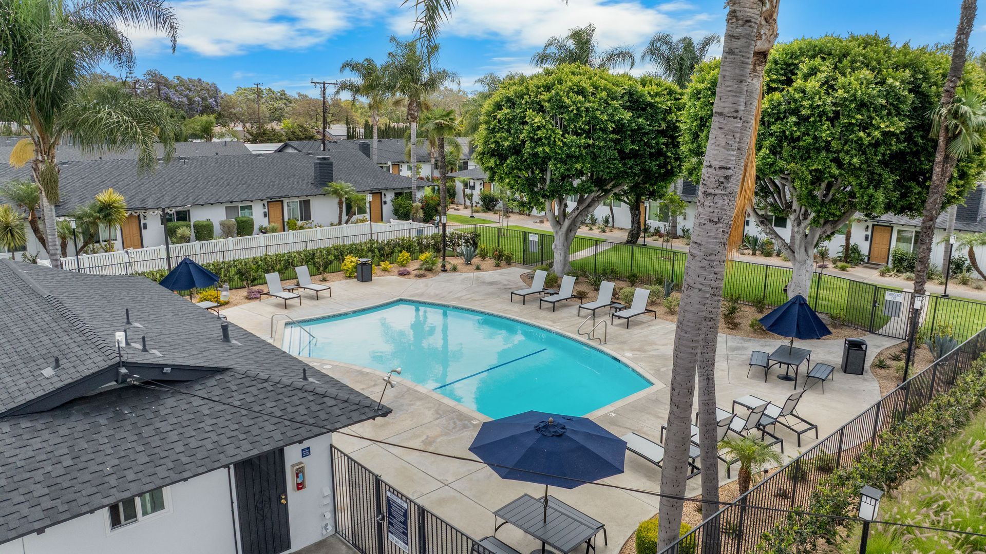 overhead view of swimming pool and lounge chairs 