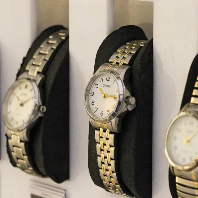 Olympic horloge met metalen schakelband