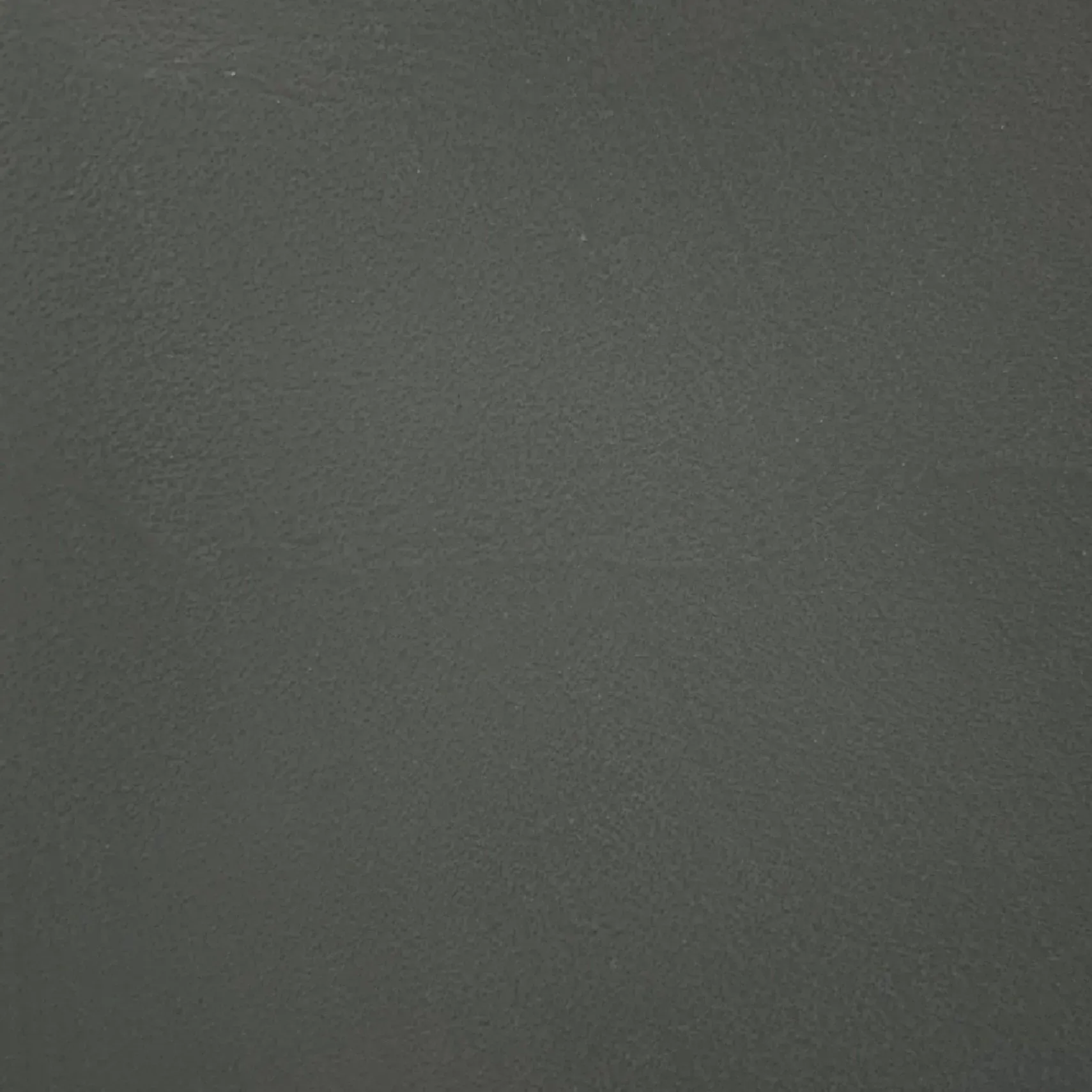 Solid gray textured surface.