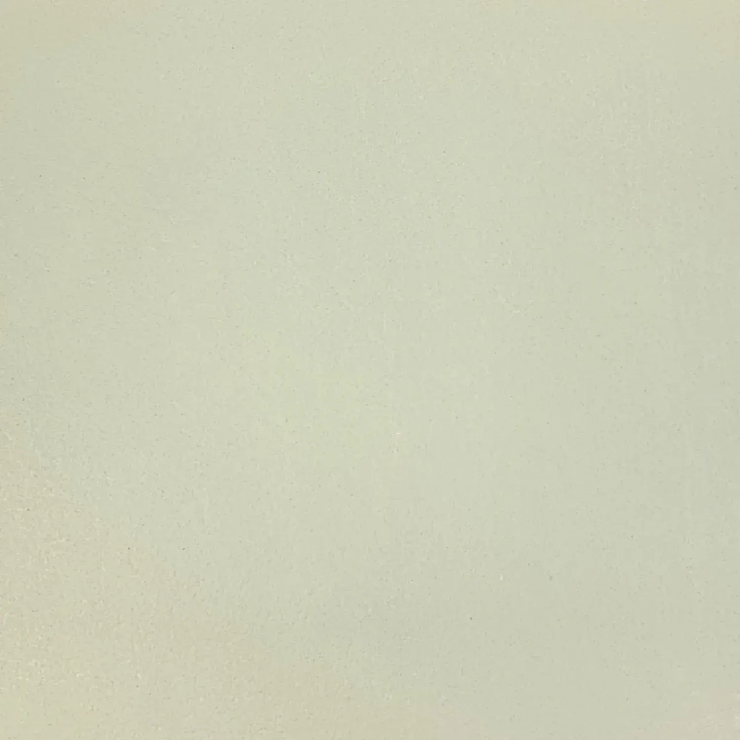 Light beige wall with a slightly textured surface.