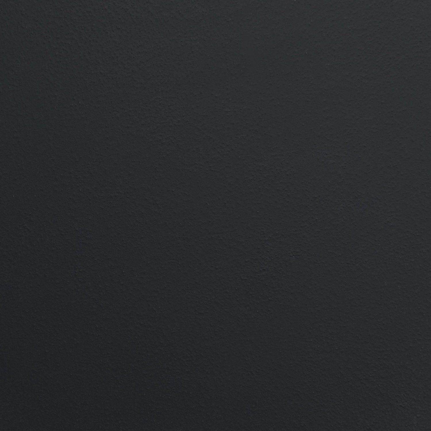 Dark gray, textured surface.