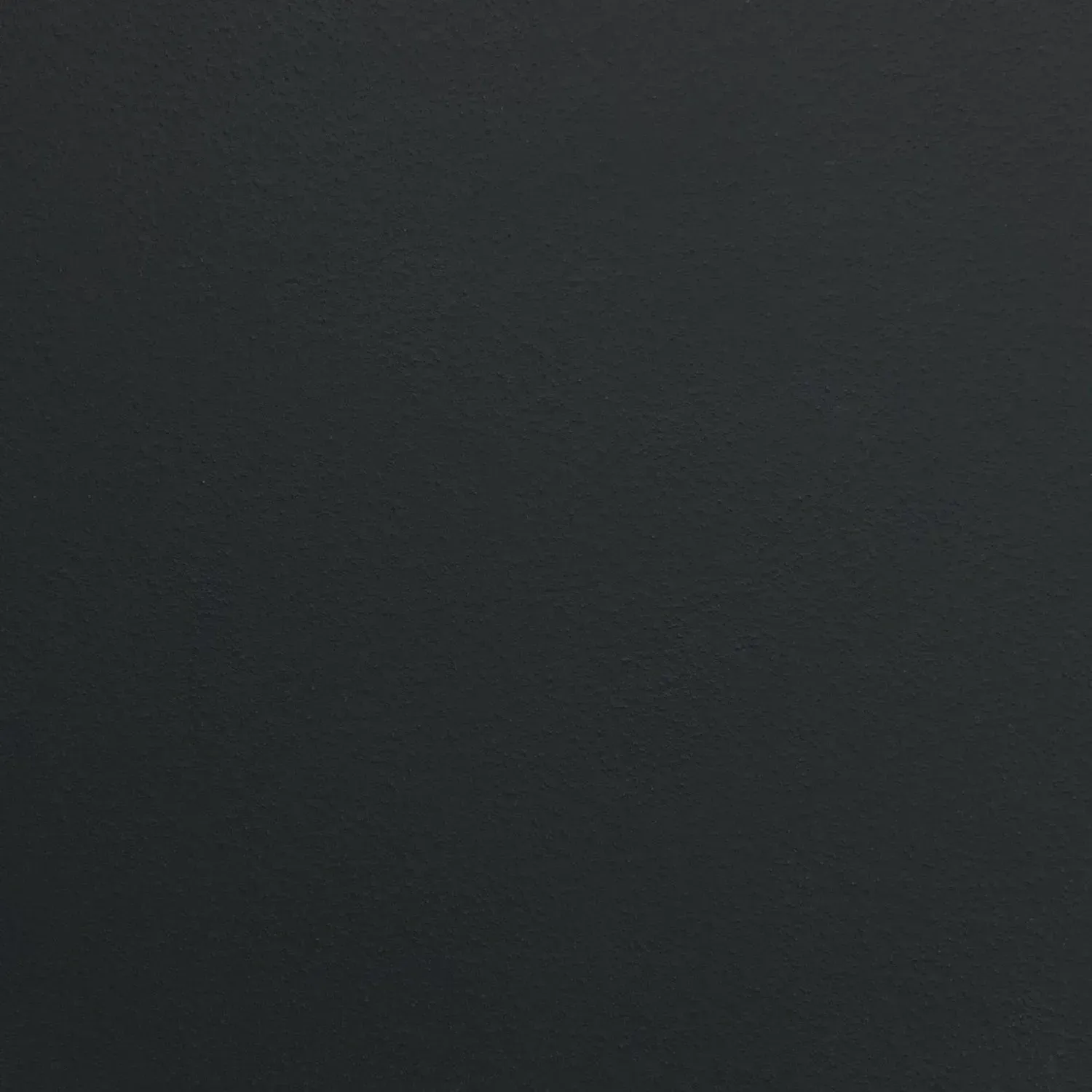 Dark gray textured background with a subtle gradient