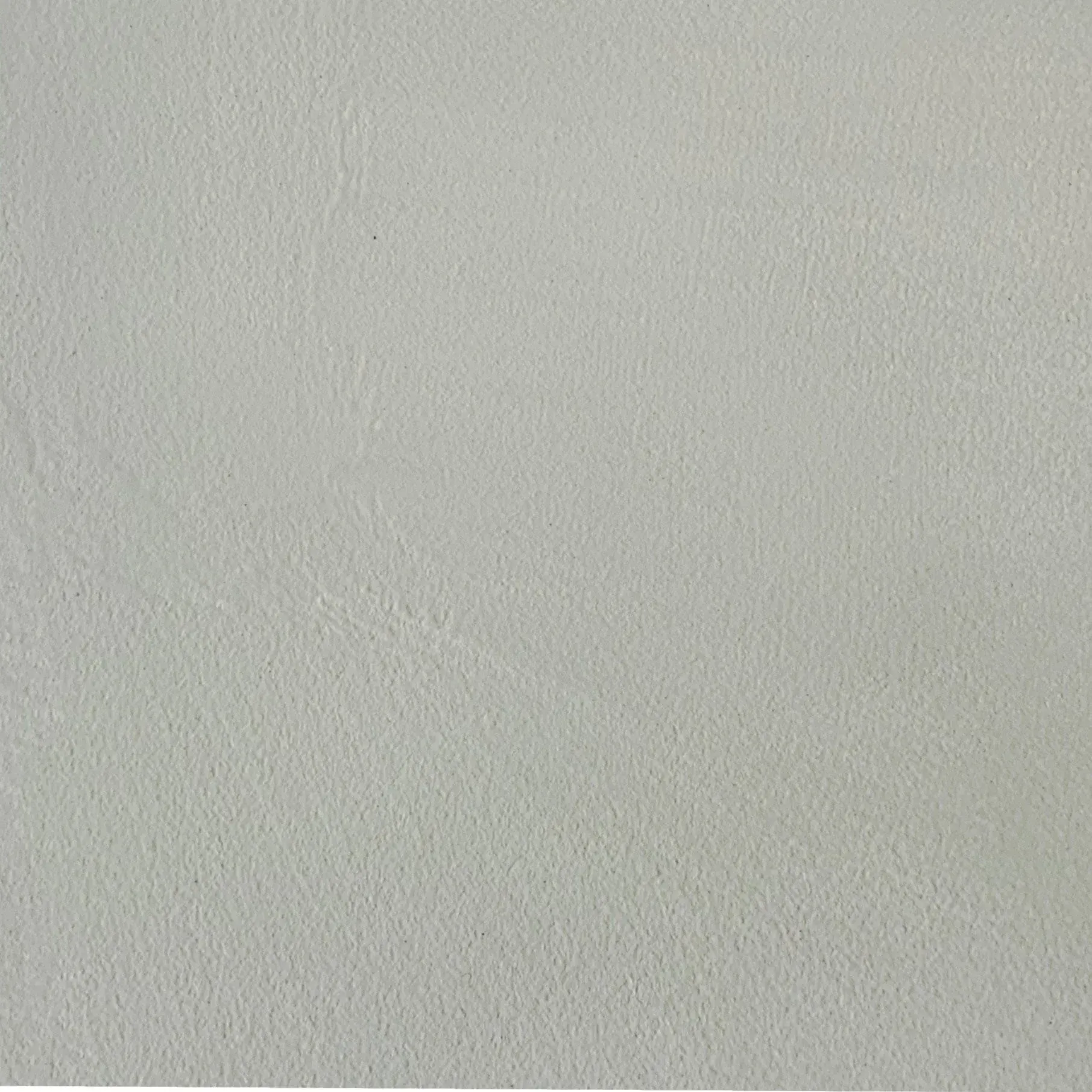 Light gray, textured wall.