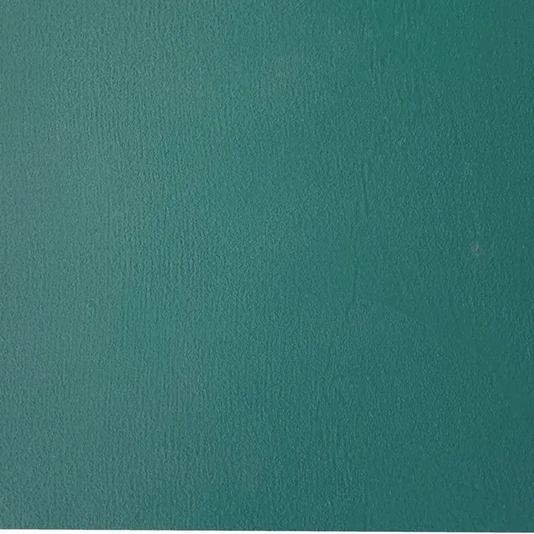 Teal green textured wall.