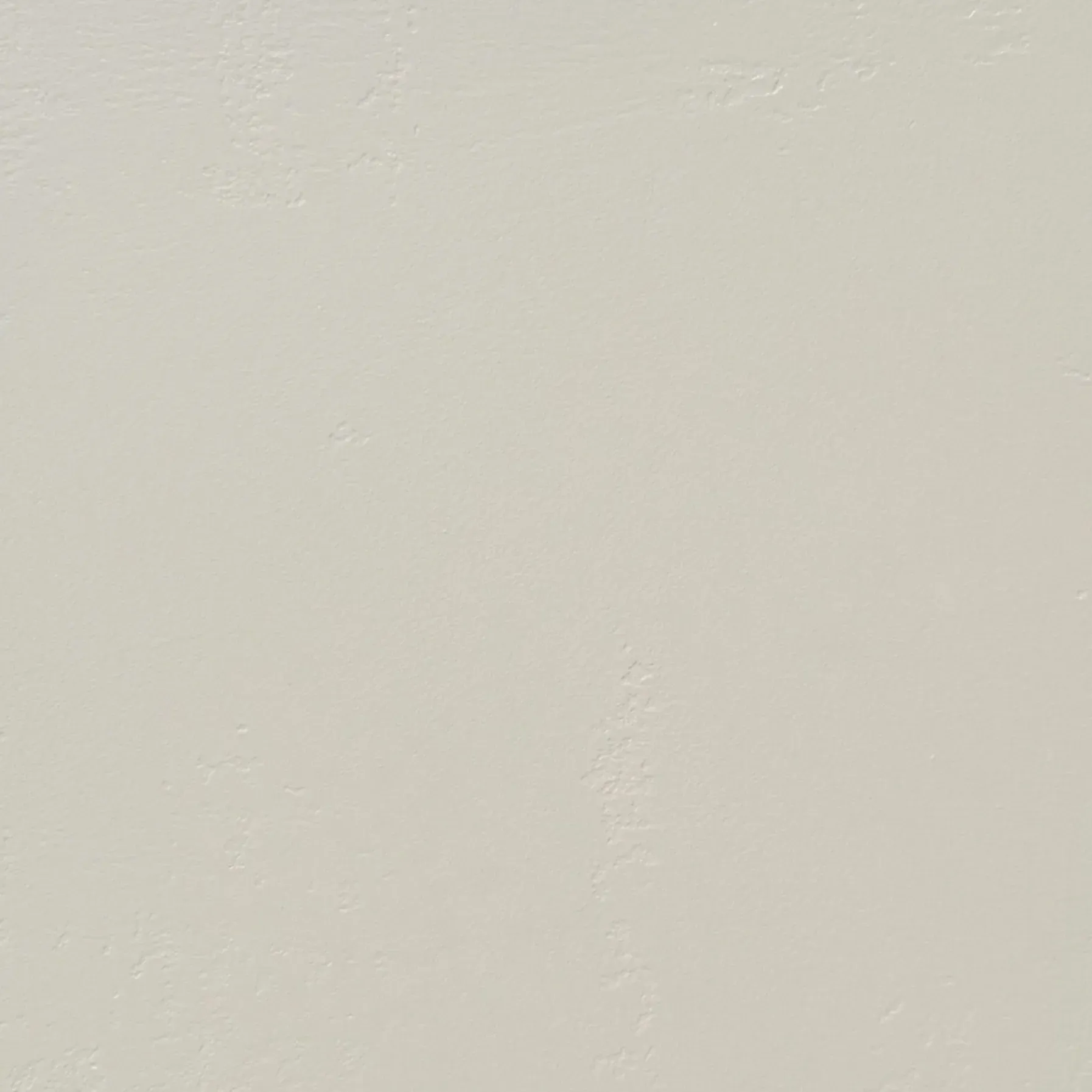 Off-white wall texture with slight imperfections.