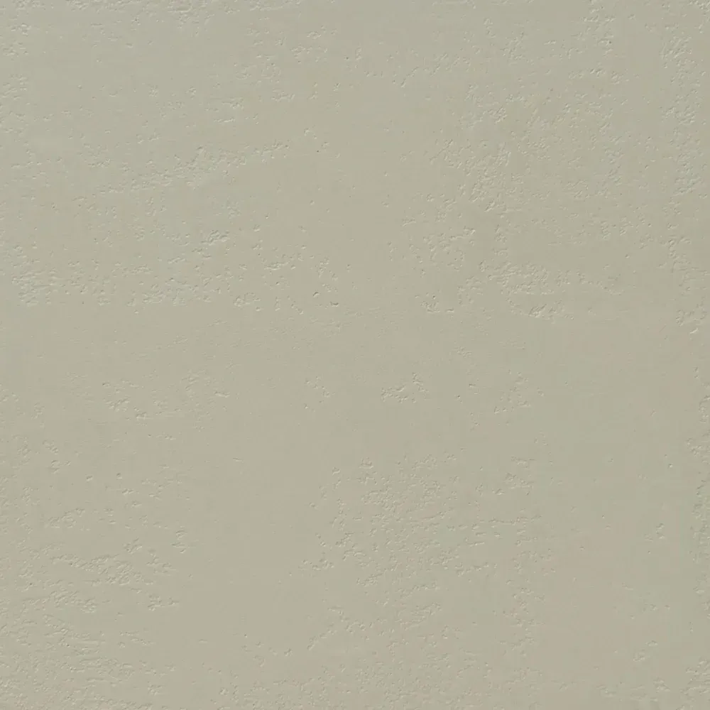 Close-up of a plain beige textured wall with subtle lighting and no visible objects