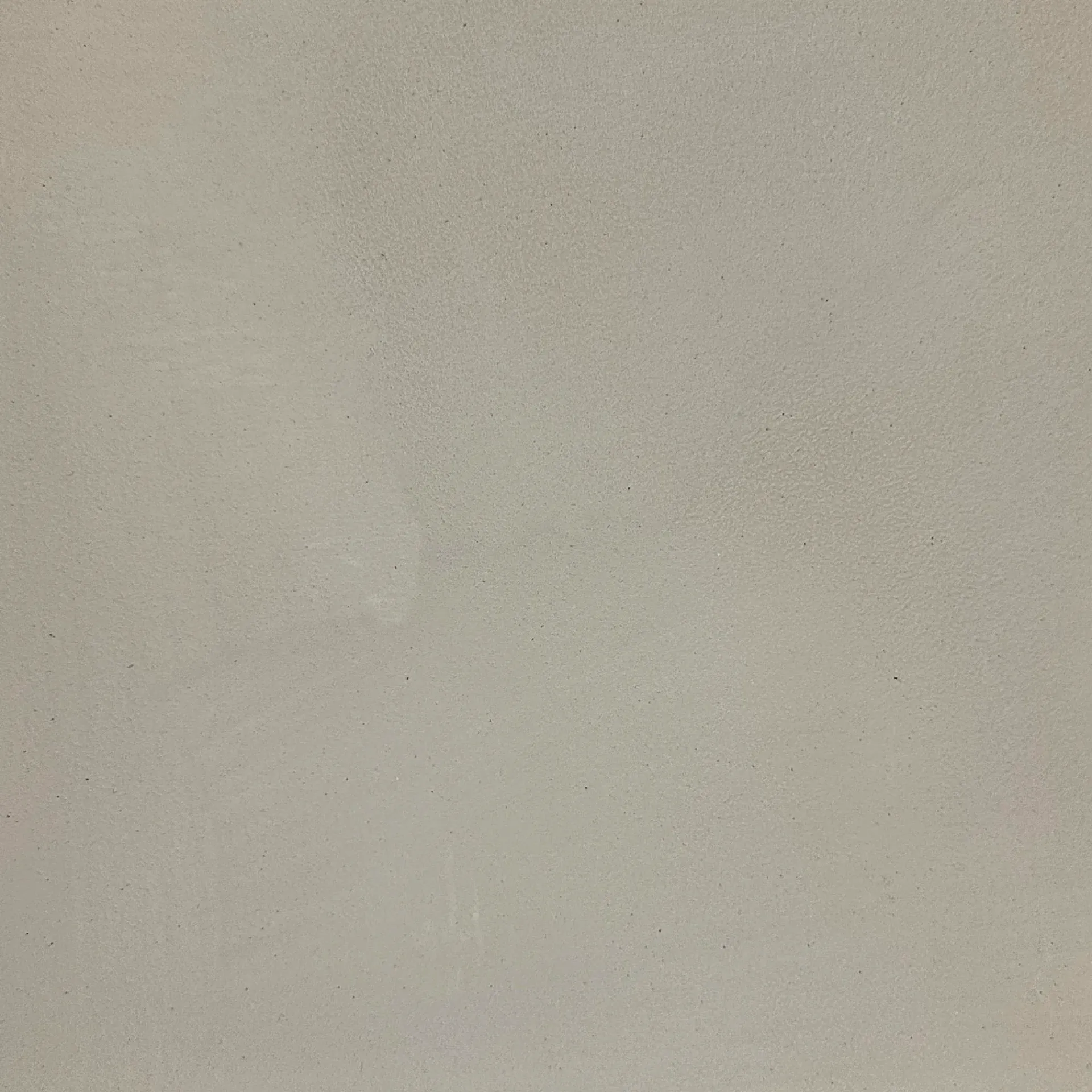 Off-white, textured surface; evenly lit, possibly a painted wall or fabric.