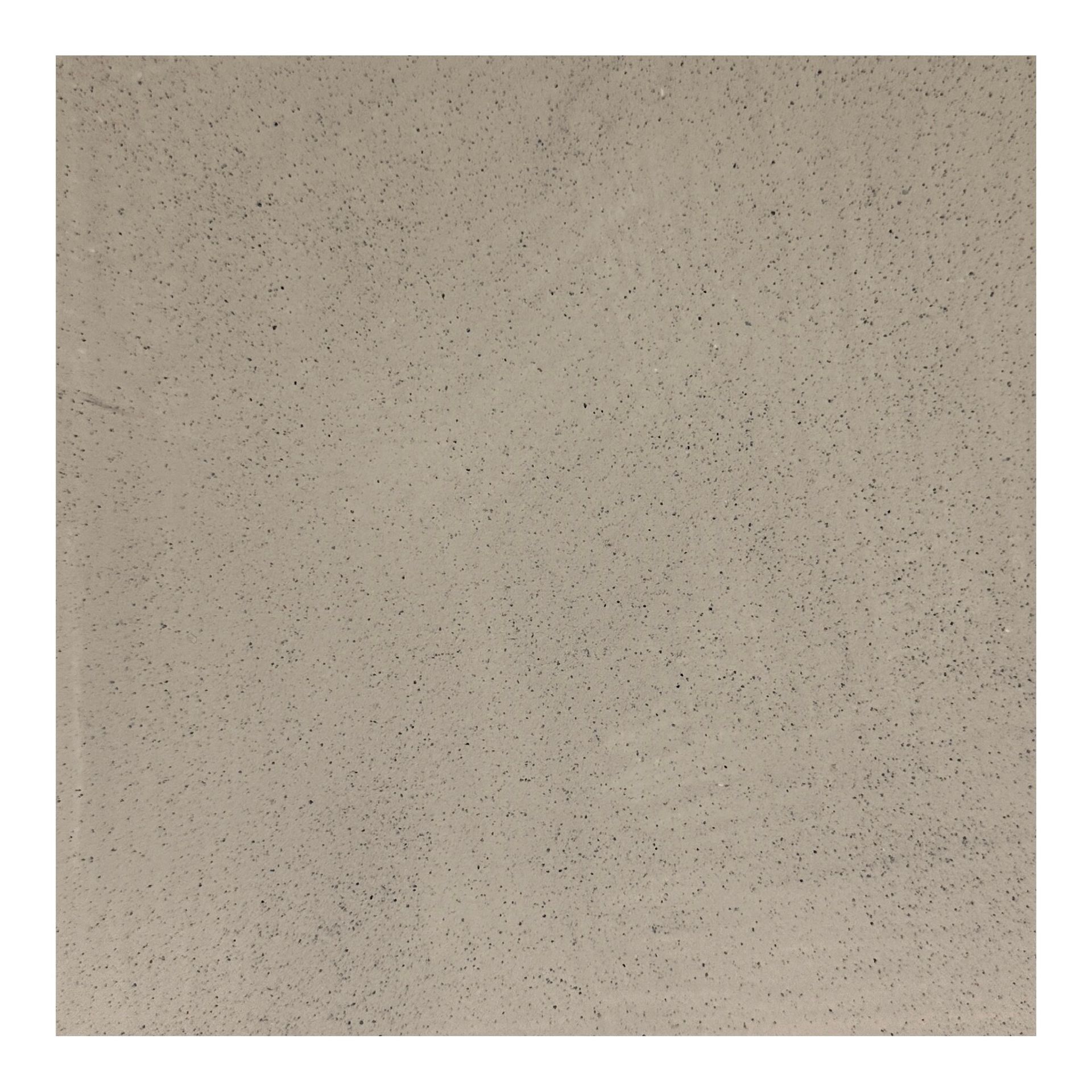 Beige speckled textured surface with a subtle pattern