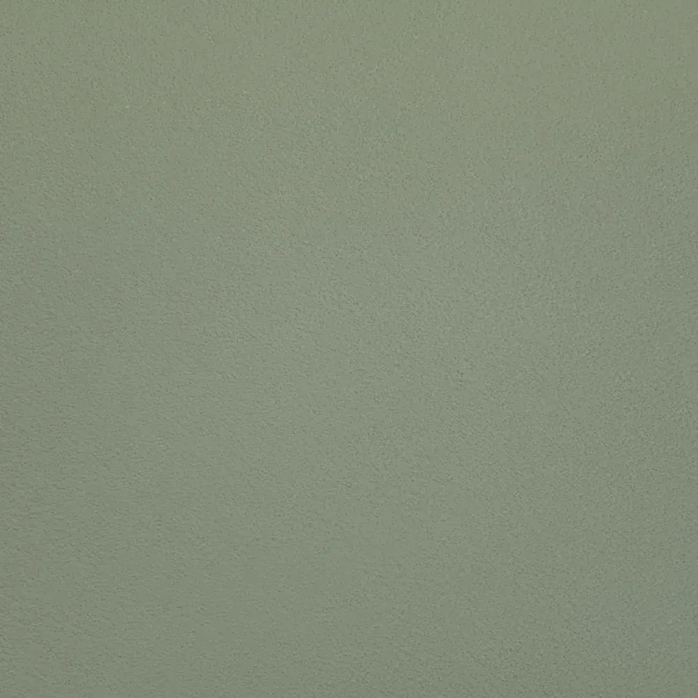Plain gray textured surface with a subtle gradient.